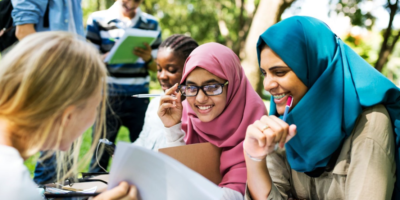 Diverse Group Of Students Discussing Ideas and Collaborating