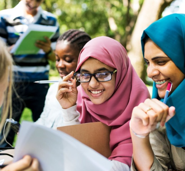 Diverse Group Of Students Discussing Ideas and Collaborating