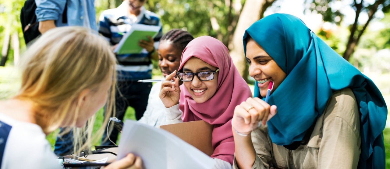 Diverse Group Of Students Discussing Ideas and Collaborating